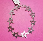Pulseira estrelas folheada a prata.