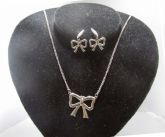 conjunto laço folhe.prata